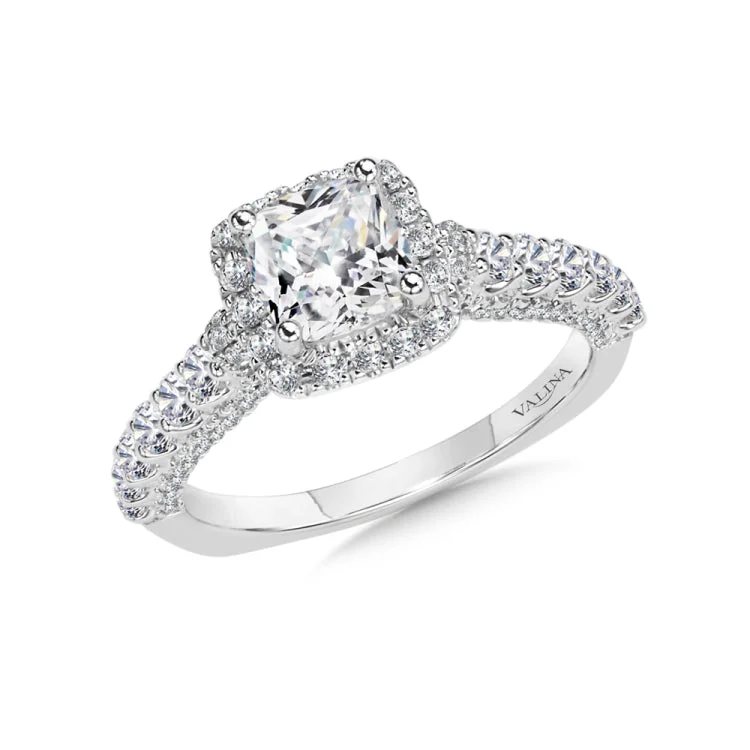 A diamond halo mount set in 14k white gold.