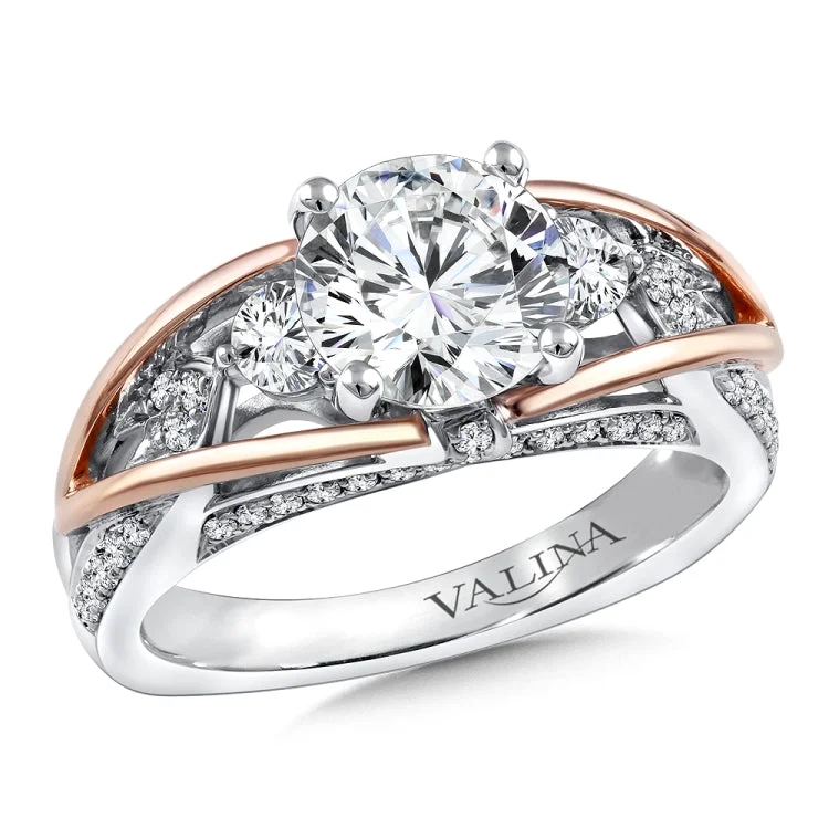 Diamond crisscross engagement ring mounting with rose gold accents and side stones set in 14k white gold.