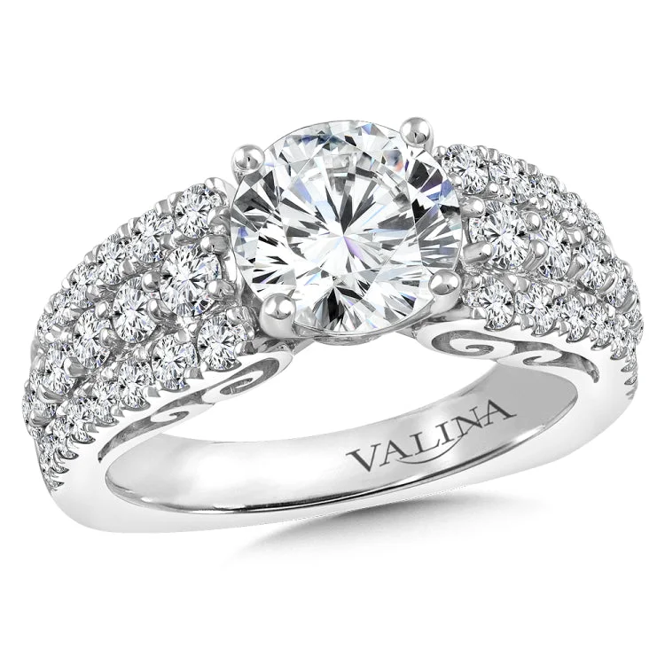 Diamond engagement ring mounting with side stones set in 14k white gold.