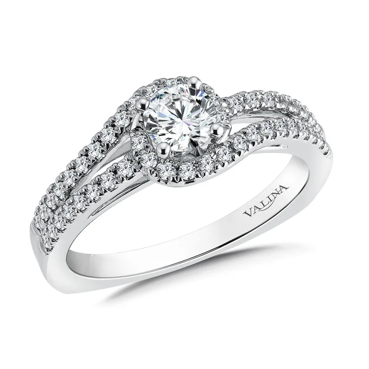 Diamond engagement ring mounting with split shank and side stones set in 14k white gold.