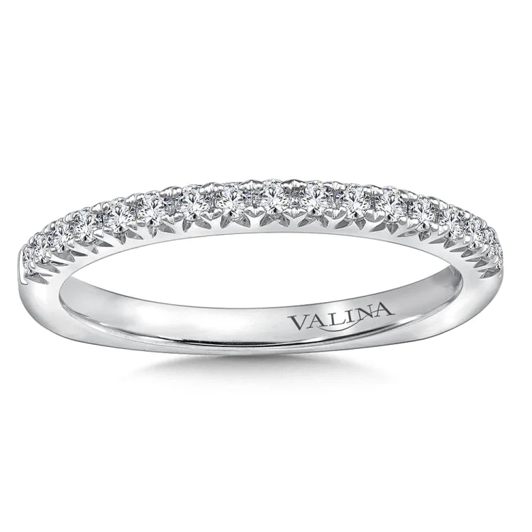 True fit matching diamond wedding band and a beautiful reminder of that special day for years to come.