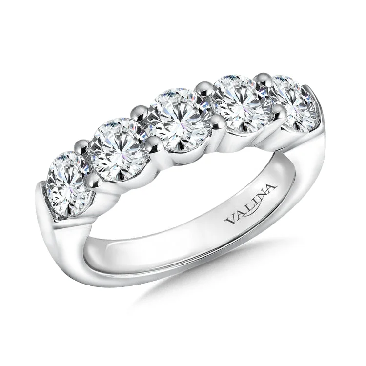 True fit matching diamond wedding band and a beautiful reminder of that special day for years to come.