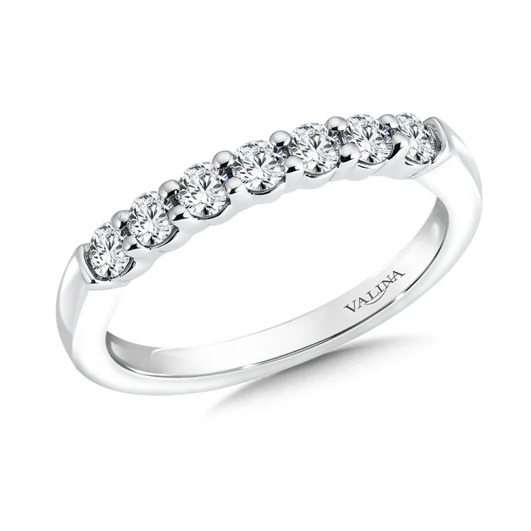 True fit matching diamond wedding band and a beautiful reminder of that special day for years to come.