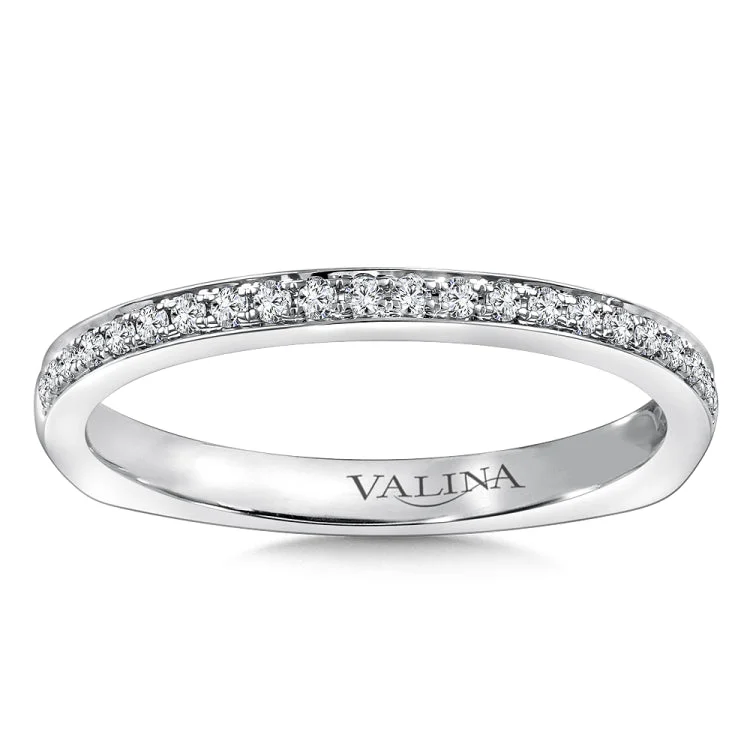 True fit matching diamond wedding band and a beautiful reminder of that special day for years to come.