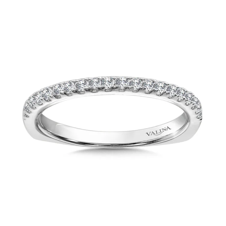 True fit matching diamond wedding band and a beautiful reminder of that special day for years to come.