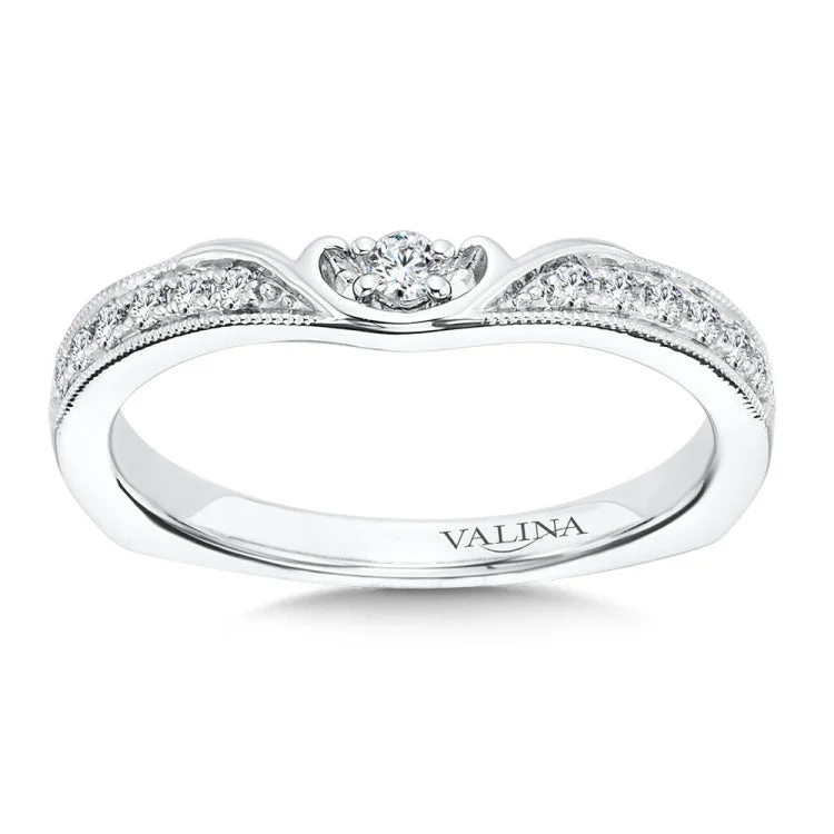 Wedding ring with a row of round diamonds bordered with 14k white gold milgrain detailing to accent the center stone.