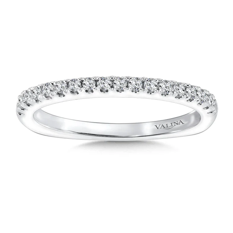 True fit matching diamond wedding band and a beautiful reminder of that special day for years to come.