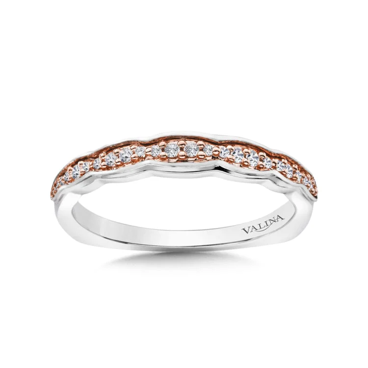 True fit matching diamond wedding band and a beautiful reminder of that special day for years to come.