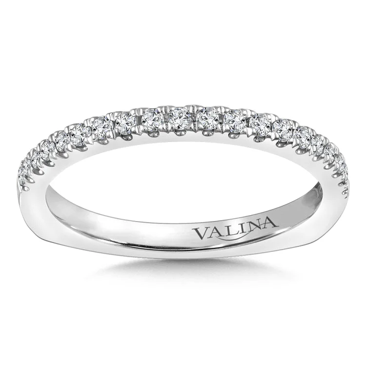 True fit matching diamond wedding band and a beautiful reminder of that special day for years to come.