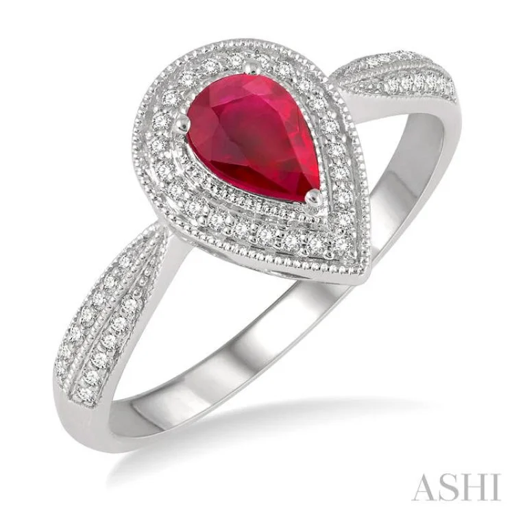 1/6 Ctw Pointed Shank 6X4 MM Pear Cut Ruby & Round Cut Diamond Precious Ring in 10K White Gold